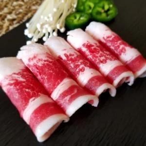 Presentación de plato de panceta de vaca